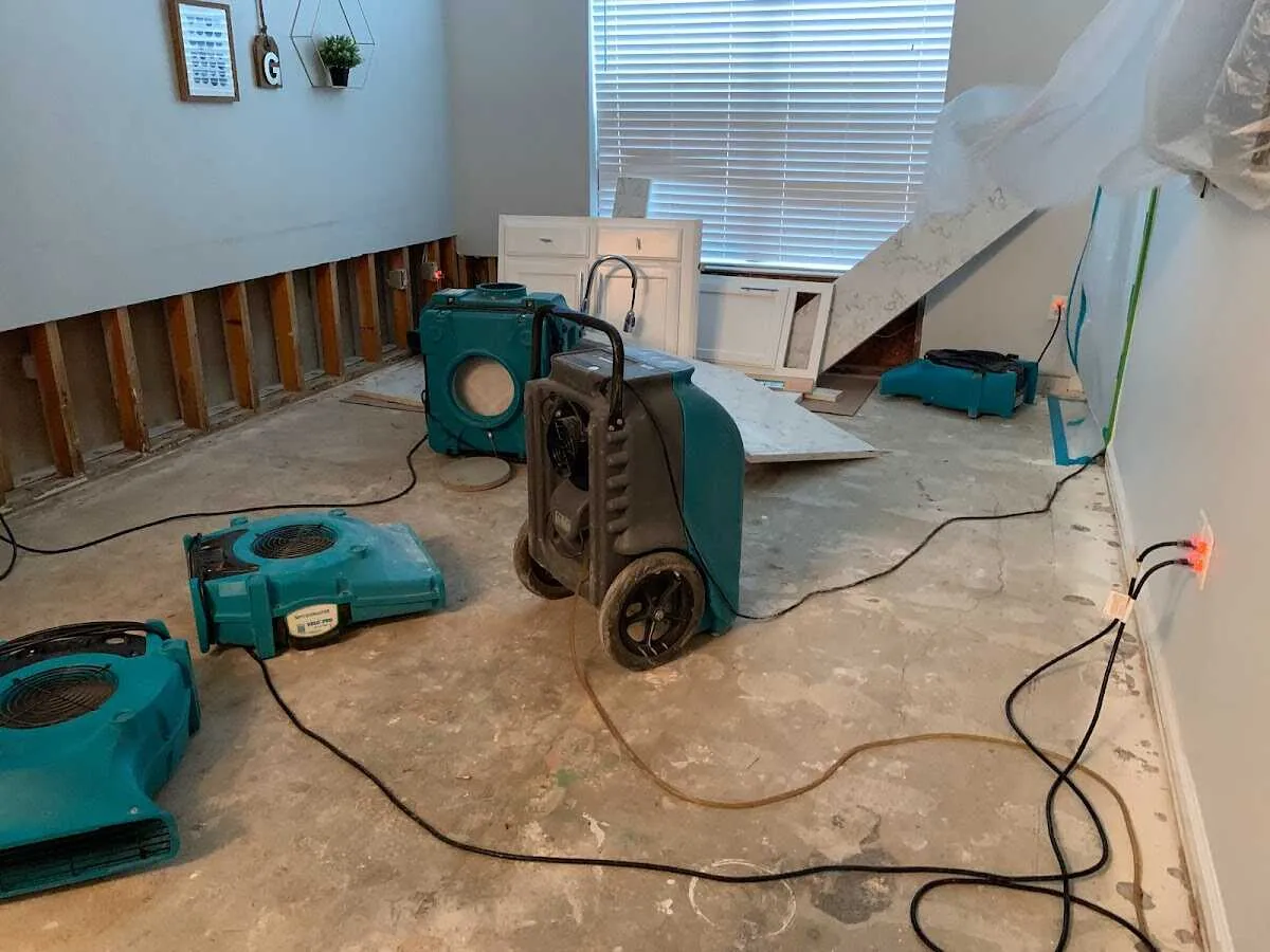 Dehumidifier in flood-cut room for Water Damage Restoration in Vinita